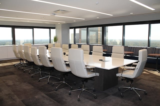 Image of a conference table and chairs